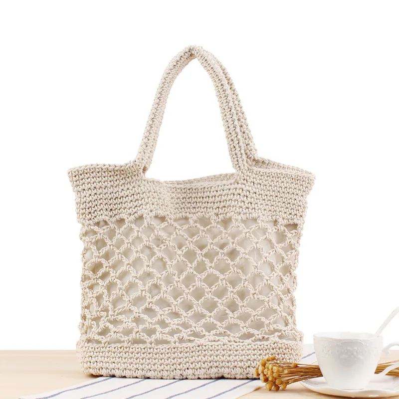 

SP766 New solid color cotton thread hand crocheted bag female forest portable holiday beach straw bag, Picture shown