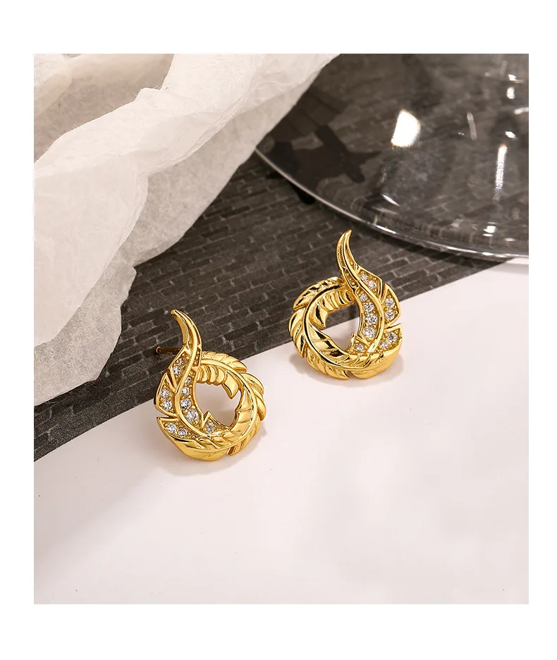

VIANRLA 925 sterling silver gold plated leaf shape stud earring with zircon