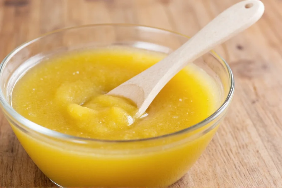 Ginger paste stored in small glass jars with measurement markings for kitchen use
