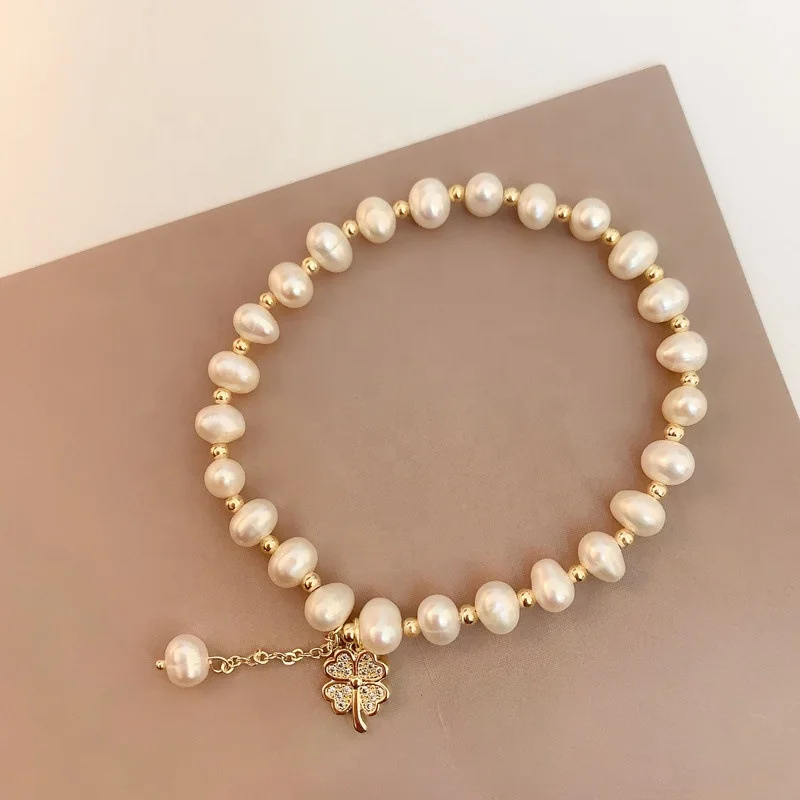 

Wholesale baroque freshwater pearls zirconia gold four leaf clover bracelets jewelry