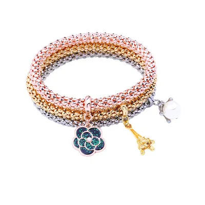 

Hot Sale Eiffel Tower Rose Flower Pearl Charm Bracelet Elastic Three Pieces Set Gold Plated Corn Chain Bracelet For Women