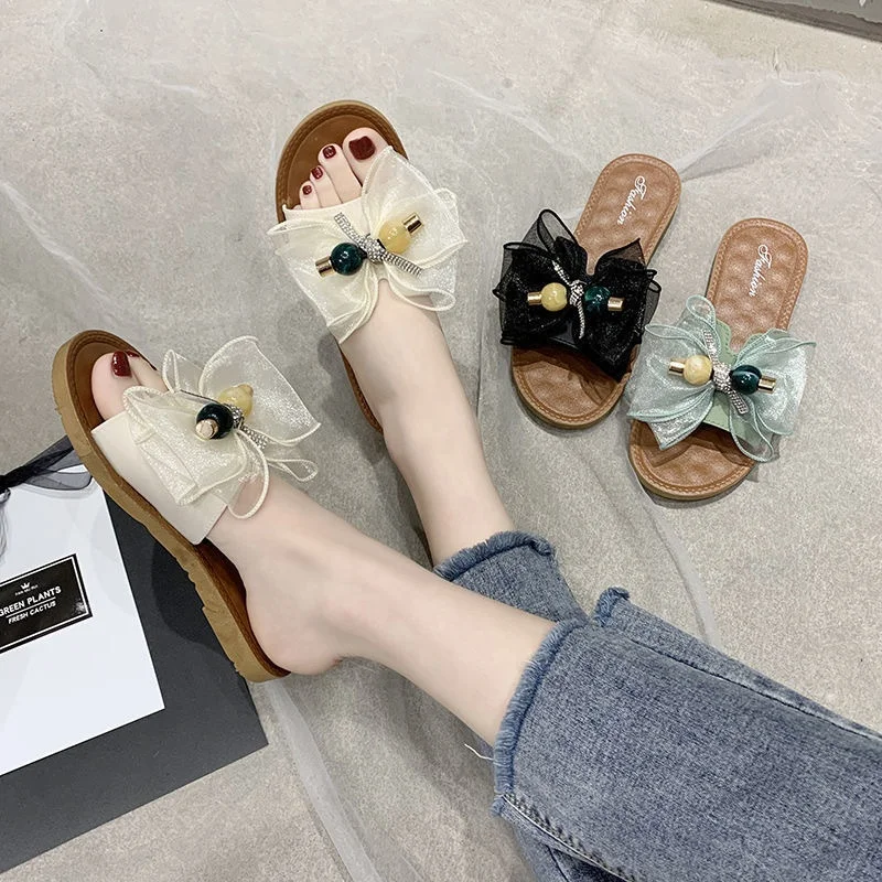 

FashioninsWind slippers women's summer wear fresh one-word sandals Internet Celebrity All-match bow soft bottom slippers