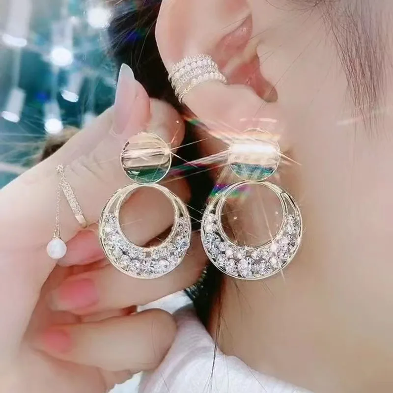 

New vintage temperament silver needle earrings round hollow out diamond earrings for female