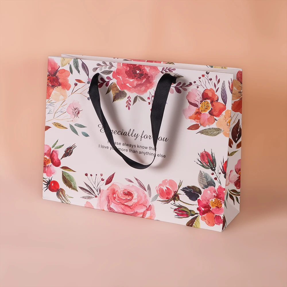 

Clothing luxury wholesale eco-friendly craft shopping portable paper packaging bag with handle