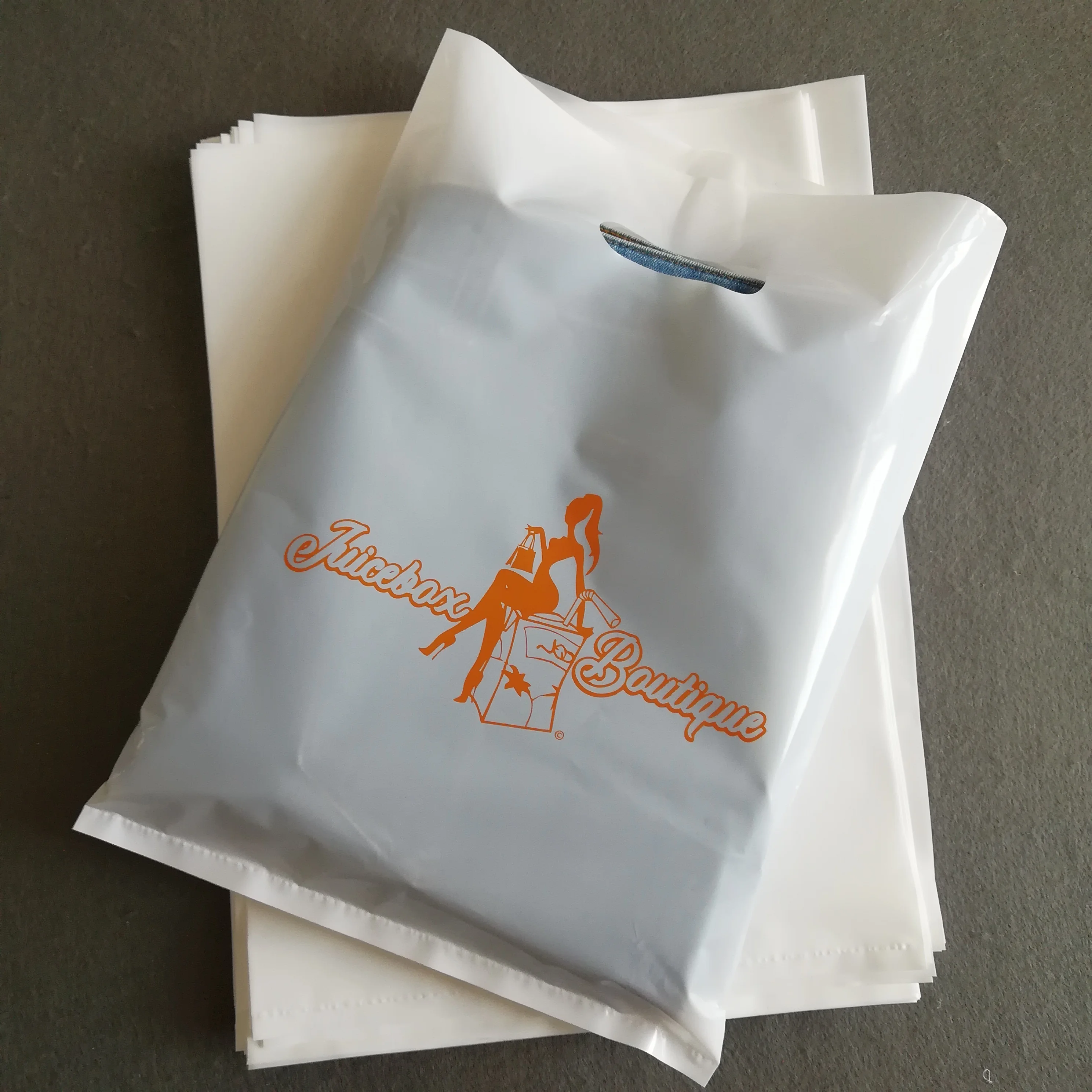 

Die Cut PE Plastic Shopping Bag handle biodegradable shopping plastic bag