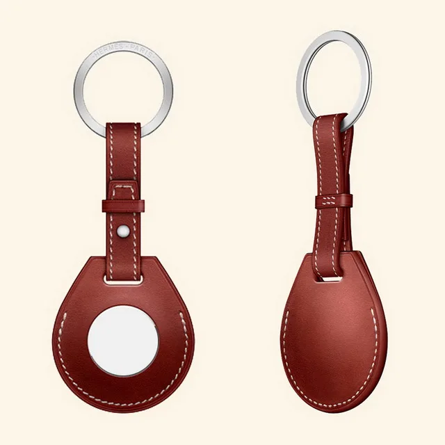 

Portable protector genuine leather case for AirTag with adjustable metal buckle keychain shape., Customized