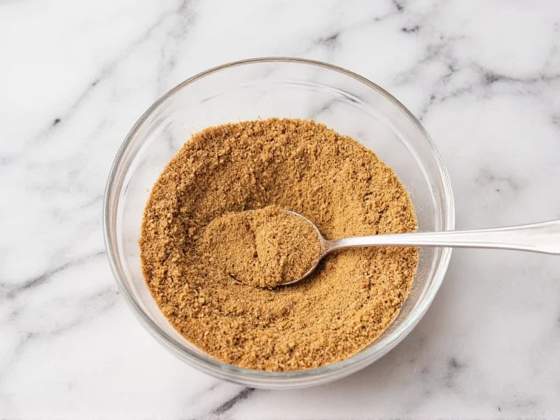 Mixing everything bagel seasoning in small bowl with spoon