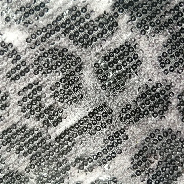 

Hot sale European style Poly mesh with sequins all over embroidery with animal print new design for dress fabric, Customized color