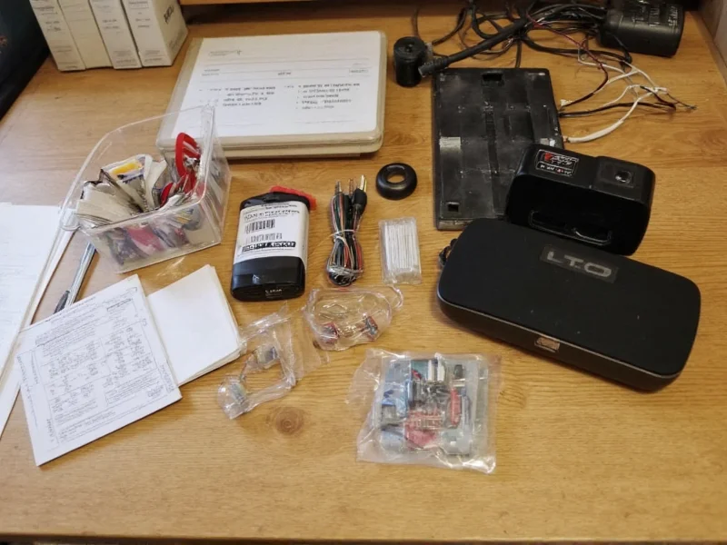 DIY Bluetooth speaker kit components laid out on workbench