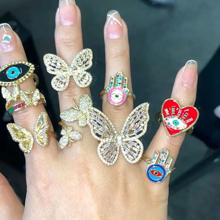 

Women Fashion Gold Plated Iced Out Cubic Zirconia Evil Eyes Butterfly Adjustable Rings Jewelry Wholesale, Gold , pink , blue
