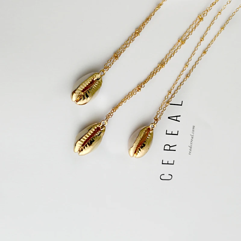 

Gold Dipped White Shell Necklace for Women Bohemia Cowrie Shell Pendants Necklaces Summer Simple Jewelry