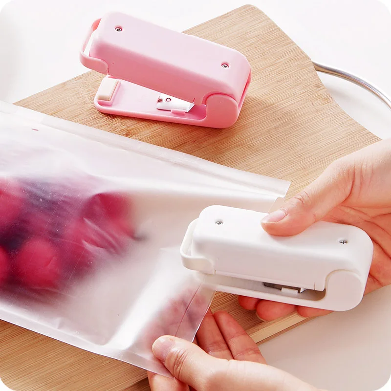 

Portable Bag Clips Mini Electronic Sealer Machine Handheld Heat Sealing Vacuum Impulse Plastic Bag Clip Work With Battery, White/pink