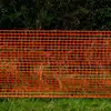 skiing field construction project orange plastic fence