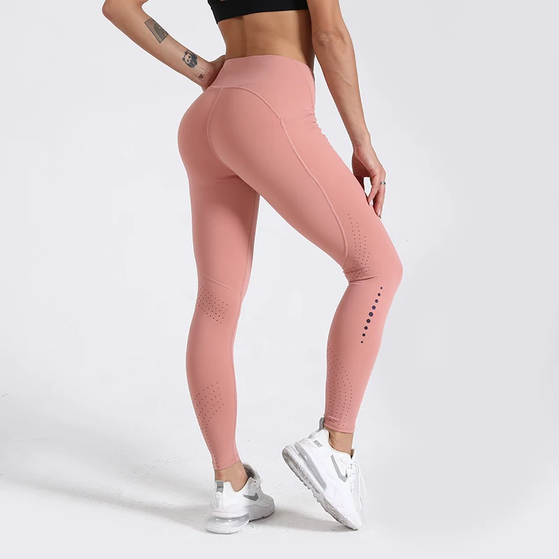 

High-waist pocket yoga pants women's hollow laser stitching hip-lifting tight-fitting sports running fitness pants, Solid color