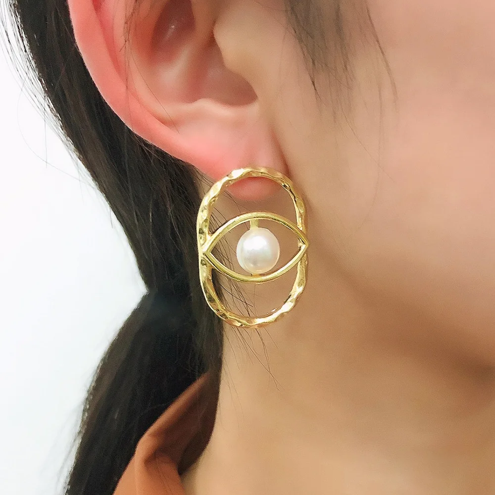 

Kaimei 2021 fashion geometric earrings hollow imitation pearl eye stud earrings fashion creative art eye stud gold earrings, Many colors fyi