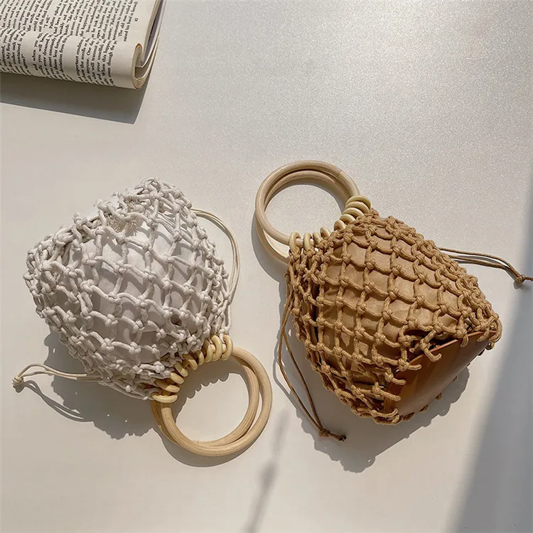 

New canvas small hand bag personality trend handbag fashion hollow bucket bag creative woven straw handbag wholesale
