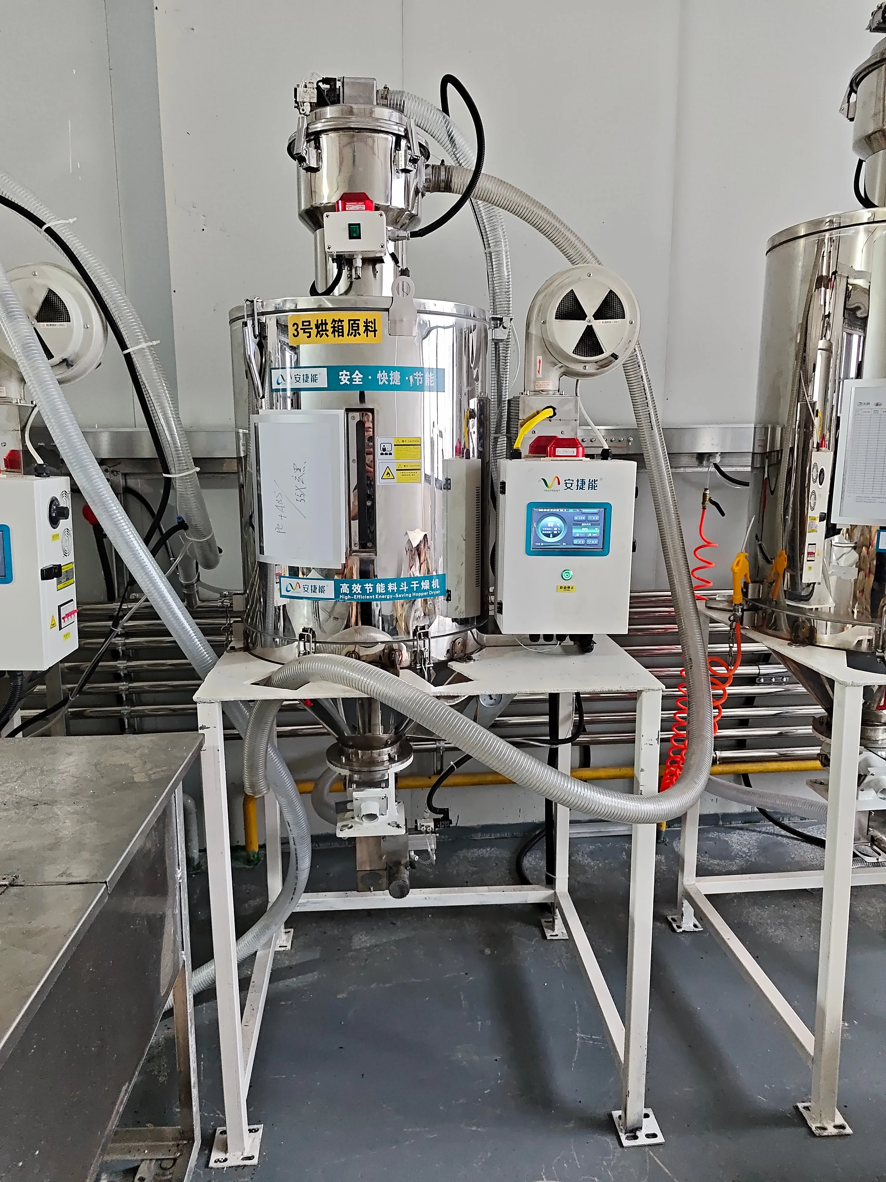 Single high-efficiency energy-saving hopper dryer labeled "Oven 3 Material," with inverter control panel clearly visible Single high-efficiency energy-saving hopper dryer labeled "Oven 3 Material," with inverter control panel clearly visible