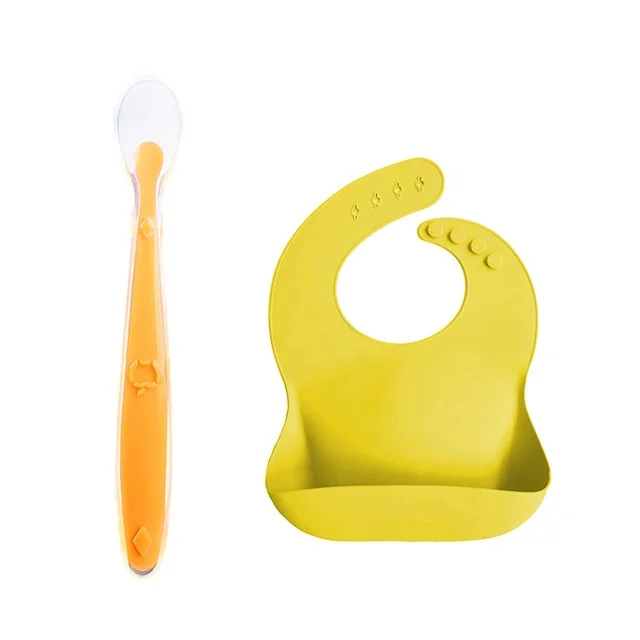

Eco Friendly Non-toxic Children Kids Silicone Product With Silicone Baby Spoon Bib Set, Pink, blue, purple, red, yellow colors teethers