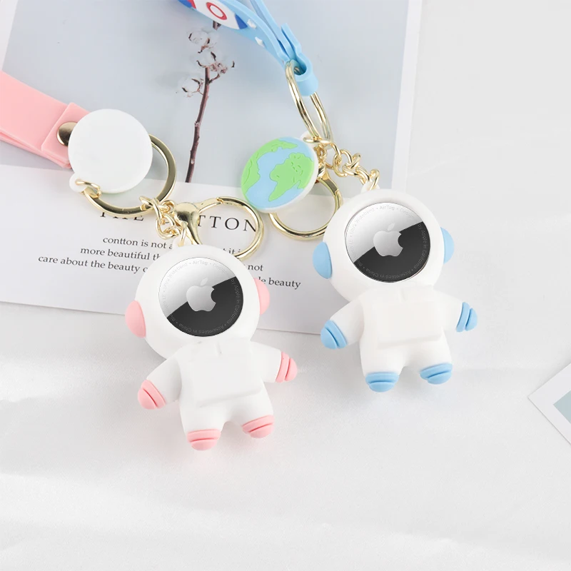 

new design airtag silicone case, cute cartoon silicone case anti-scratch 2 in 1 keychain astronaut airtag holder with hand strap