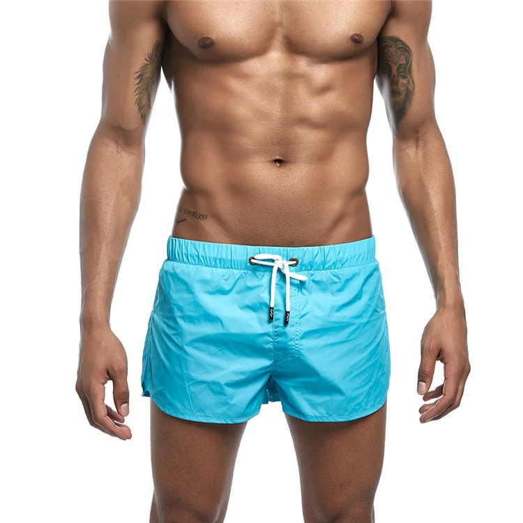 

Men's New Beach Swimming Pants Quick-drying Running Sports Three-quarter Casual Shorts