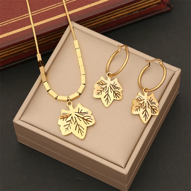 

Creative Geometry Hollow Out Maple Leaf Pendant Stainless Steel Necklace Bracelet Earrings Ring Set