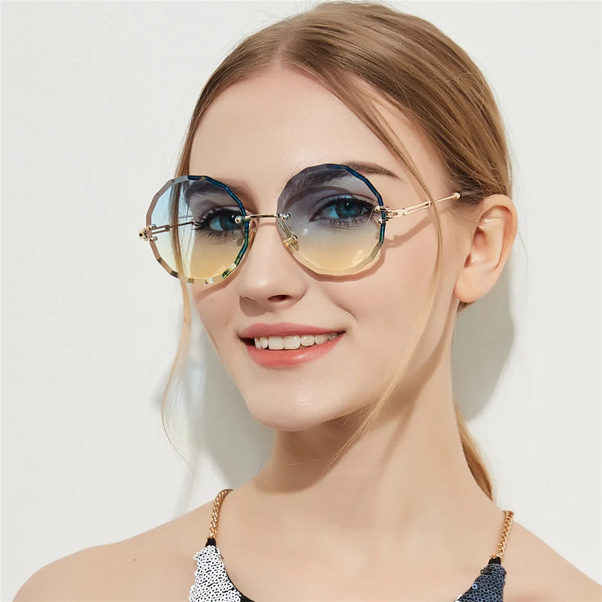 

Rimless Diamond Cut Round Retro Glasses Women Transparent Color Lens Sunglasses