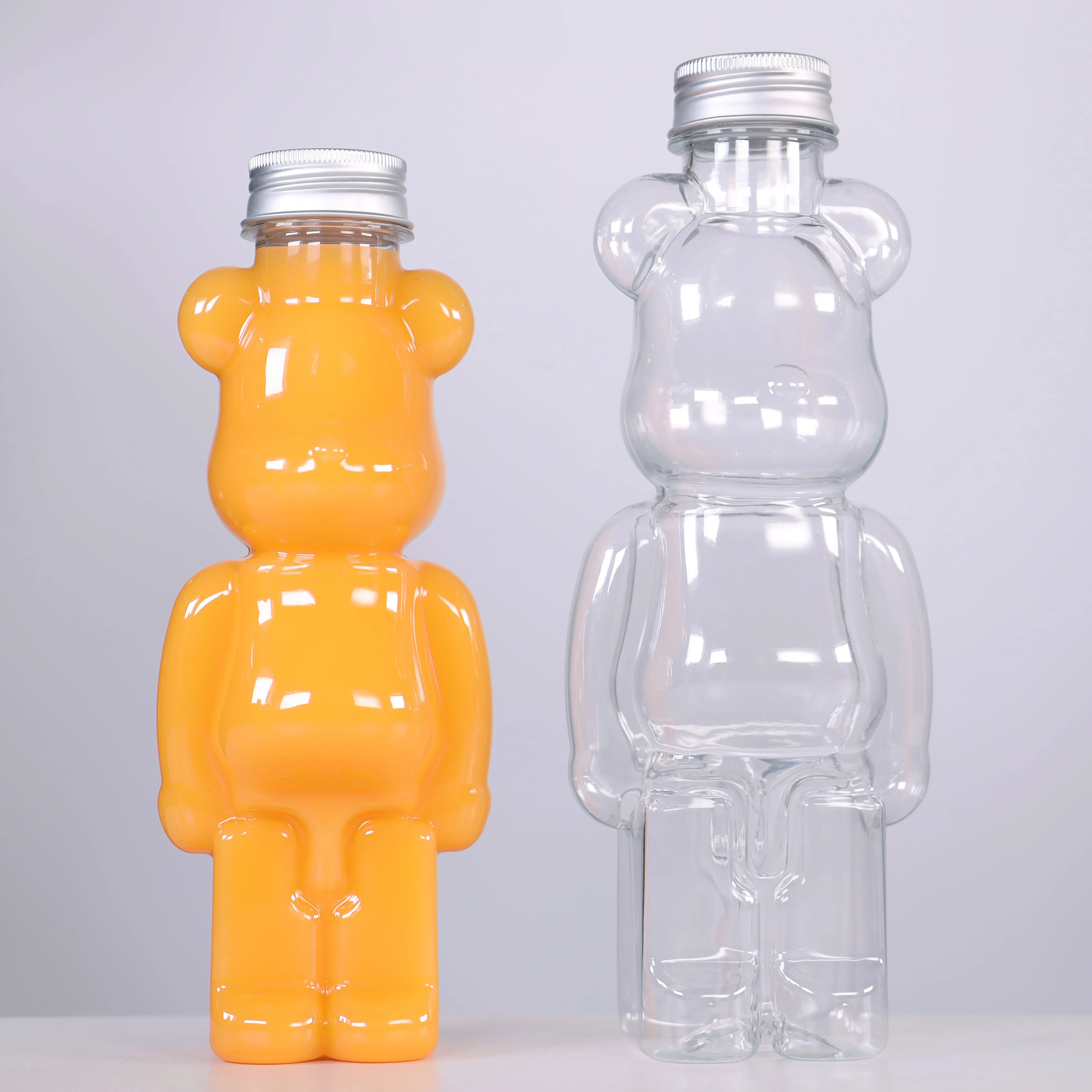 

Plastic juice packaging 400 500 700 ML clear bear Shape Pet Milk Tea Bottle Disposable Juice Beverage Bottle With Aluminum Lid