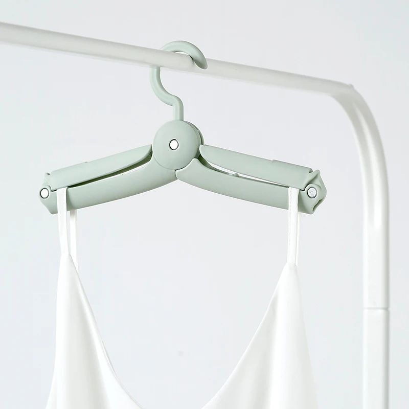 

OEM portable travel folding plastic clothes hanger