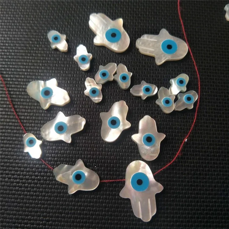 

Cheap shell 12x16mm hamsa bead pearl hand shape devil eye for jewelry making