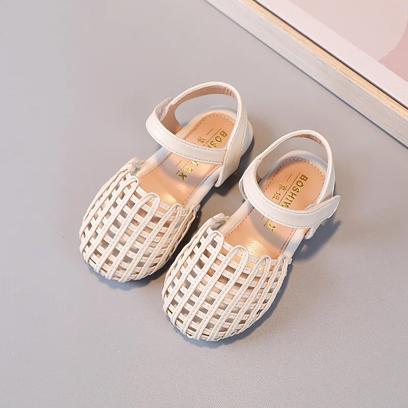 

2022 summer Korean version of the new girls' Baotou sandals woven hollow princess shoes anti-kick soft bottom baby shoes, Black/brown/white