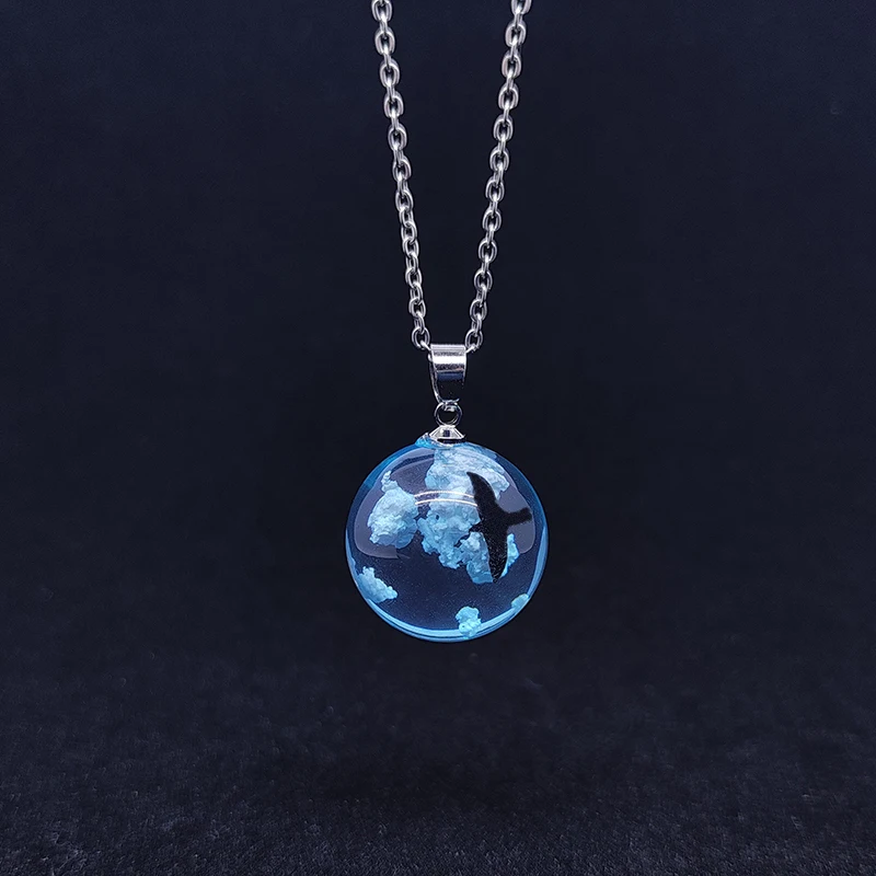 

Europe and America foreign trade blue sky white cloud Necklace Ball resin small flying bird eagle sky cloud ornament Pendant