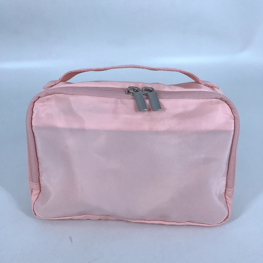 

Cute cosmetic bag pink nylon customized cosmetics travel bag for women