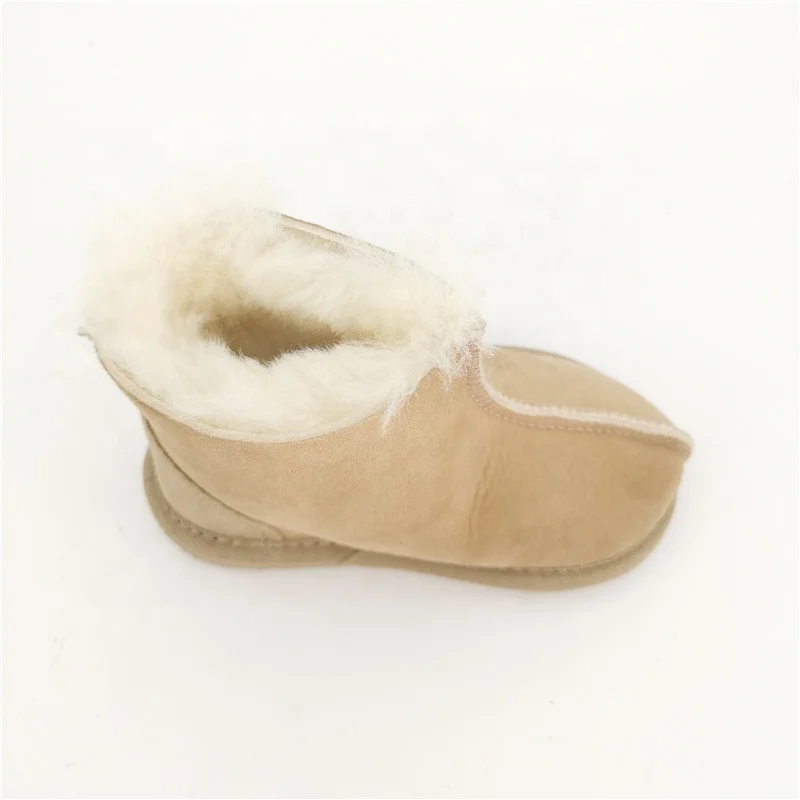 
HQS-KS001 OEM customized premium quality winter thermal genuine sheepskin slippers for children. 