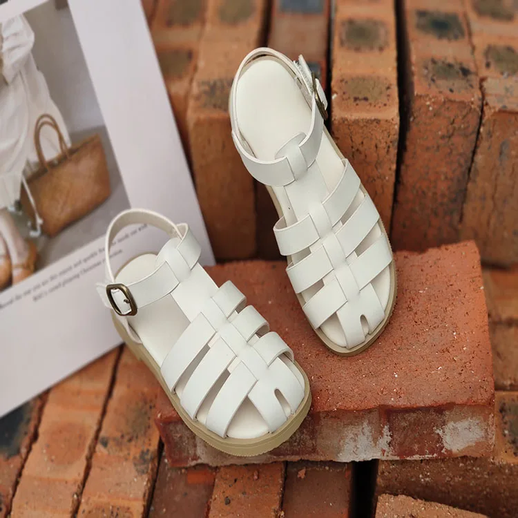 

Baotou sandals 2021 summer new wild fairy-style children's thick bottoms semi-sandals
