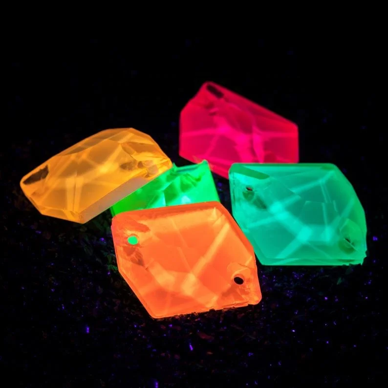 

Xiaopu MN Neon Glow Crystal Stone Cosmic Shape with 2 Holes for Clothing Sewing, Mn series
