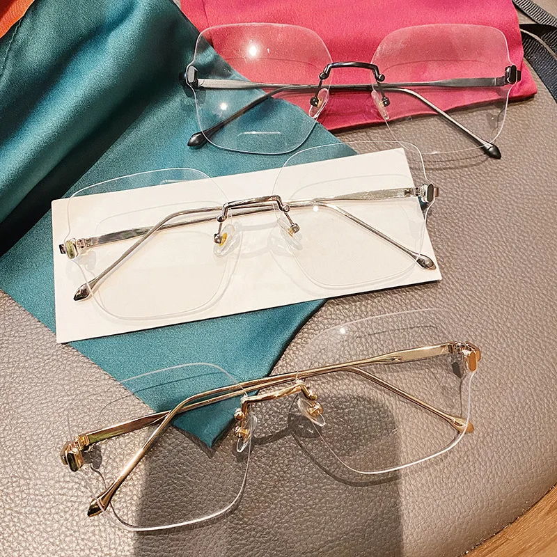 

YTSQA Q2-7155 wholesale retro Anti-blue light glasses men and women retro metal rimless optical glasses frame 2021, 3colors