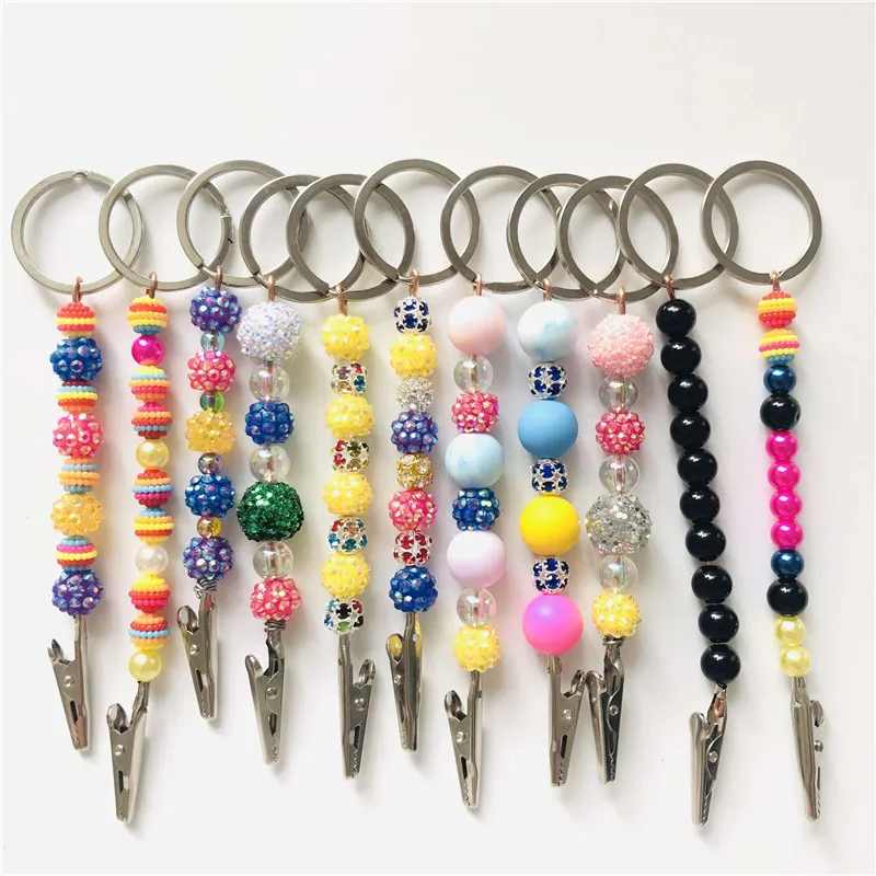 

Wholesale Pearls Shape Clips Cards Grabbers Plastic Key Chains PP Card Clip