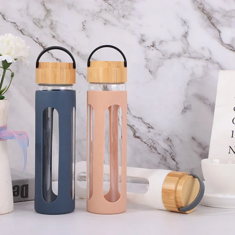 

Hot Sales Silicone Wrap New Water Cup Portable Customization Glass Water Bottle with Bamboo Lid, Customized color acceptable