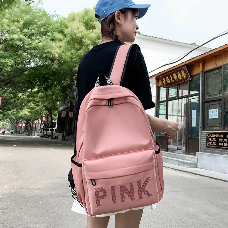 

2021 New Arrived Fashion Backpack Nylon Letter Waterproof Leisure School Bag Big Capacity Sparkly Laser Campus Bags