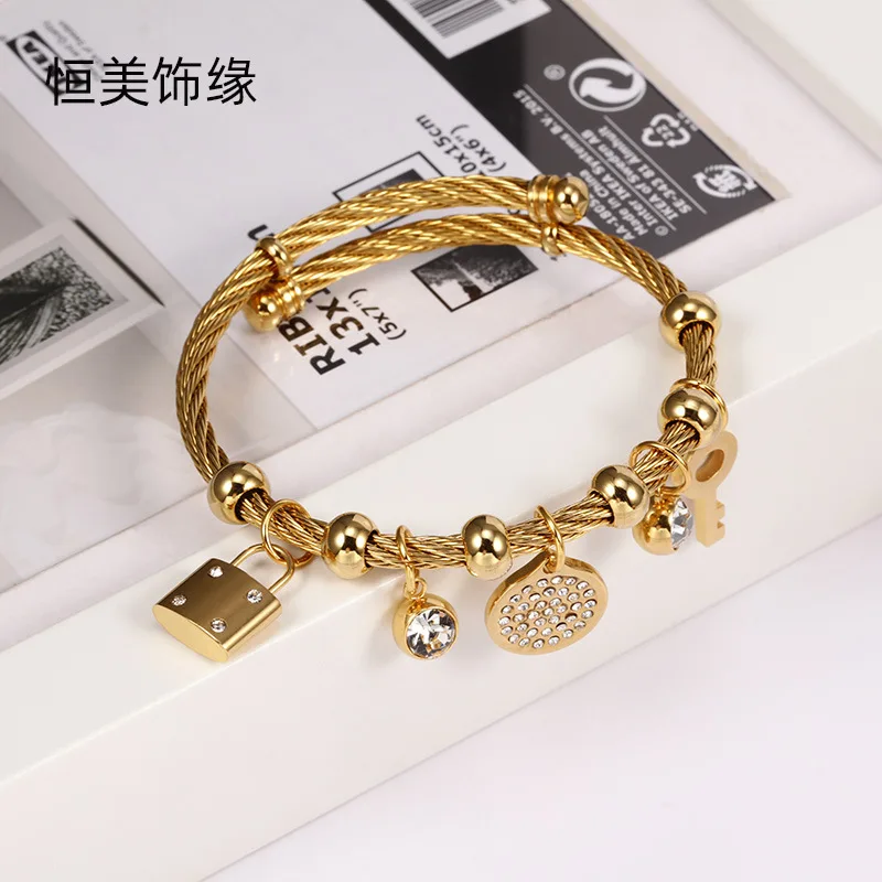 

Factory wholes Stainless steel palm titanium steel Key lock wristband With diamond 18K gold plated Bracelet Jewelry For women, 2 color