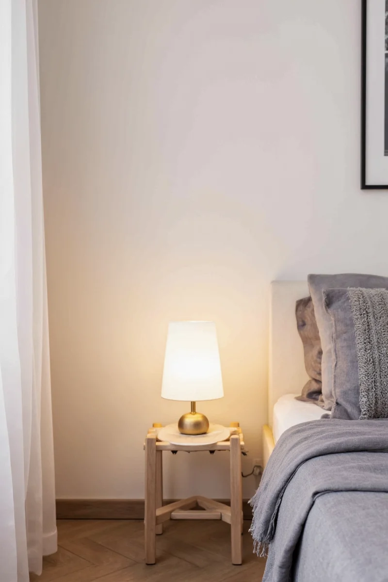 Kid selecting a bedroom mood lamp from a display
