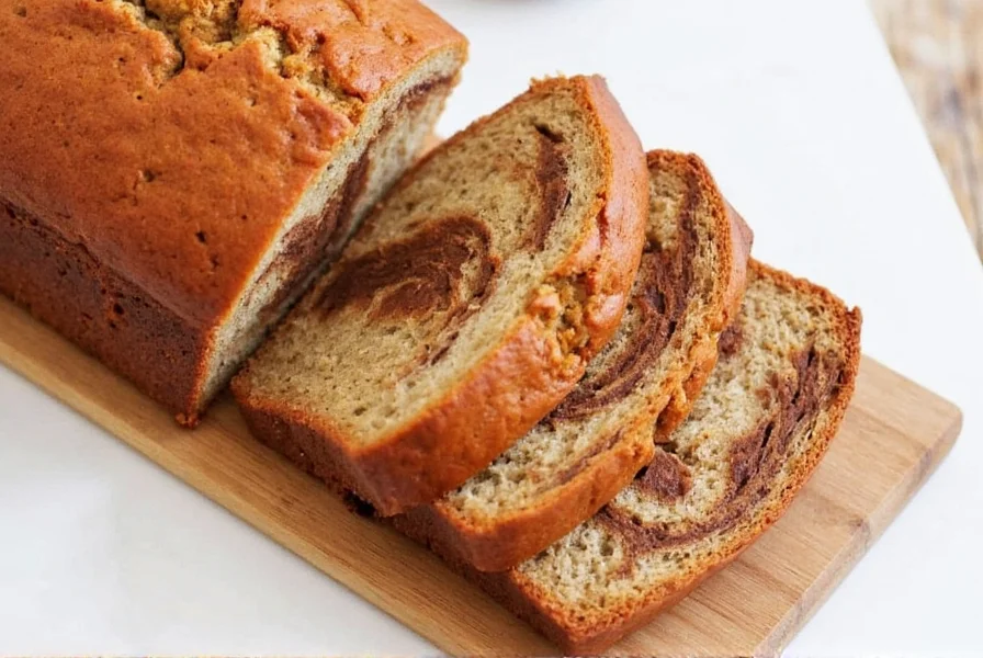 Professional cinnamon swirl banana bread with perfect spiral pattern showing moist crumb structure and defined cinnamon layers