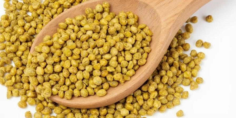 Homemade mustard being stirred in a bowl