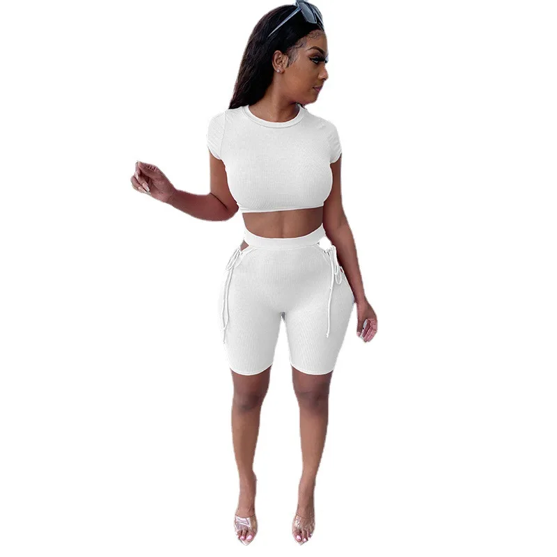 

2021 hot sale 2piece women outfit fashion rib round neck short sleeve tshirt bandage shorts sexy woman running sports suit, 3 colors and also can make as your request