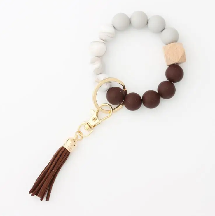 

Tassel Keychains Personalized Summer Fashion Leather Silicone Elastic With Wooden Beads Wristlet Lady Handbag Bracelet Key Rings, Photo