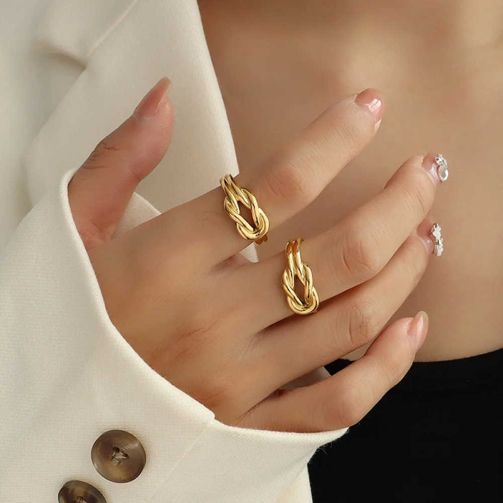 

Fashion elegant lady 18k gold plated stainless steel women jewelry Love's lucky knot knotted open ring