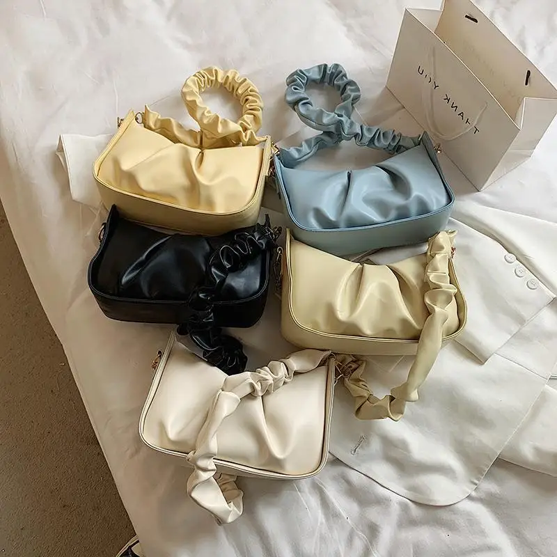 

Fashion handbag 2021 new fold cloud bag soft jiaozi bag acrylic chain shoulder armpit bag generation