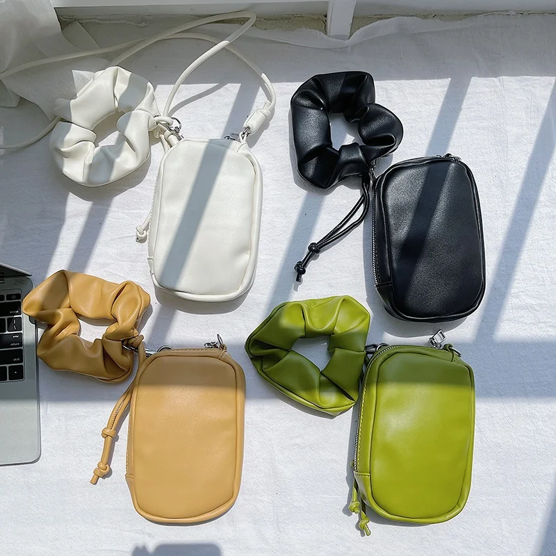 

Korean version of the new female packet shoulder cross-body bag fashion PU soft mobile phone bag pleated oval bag