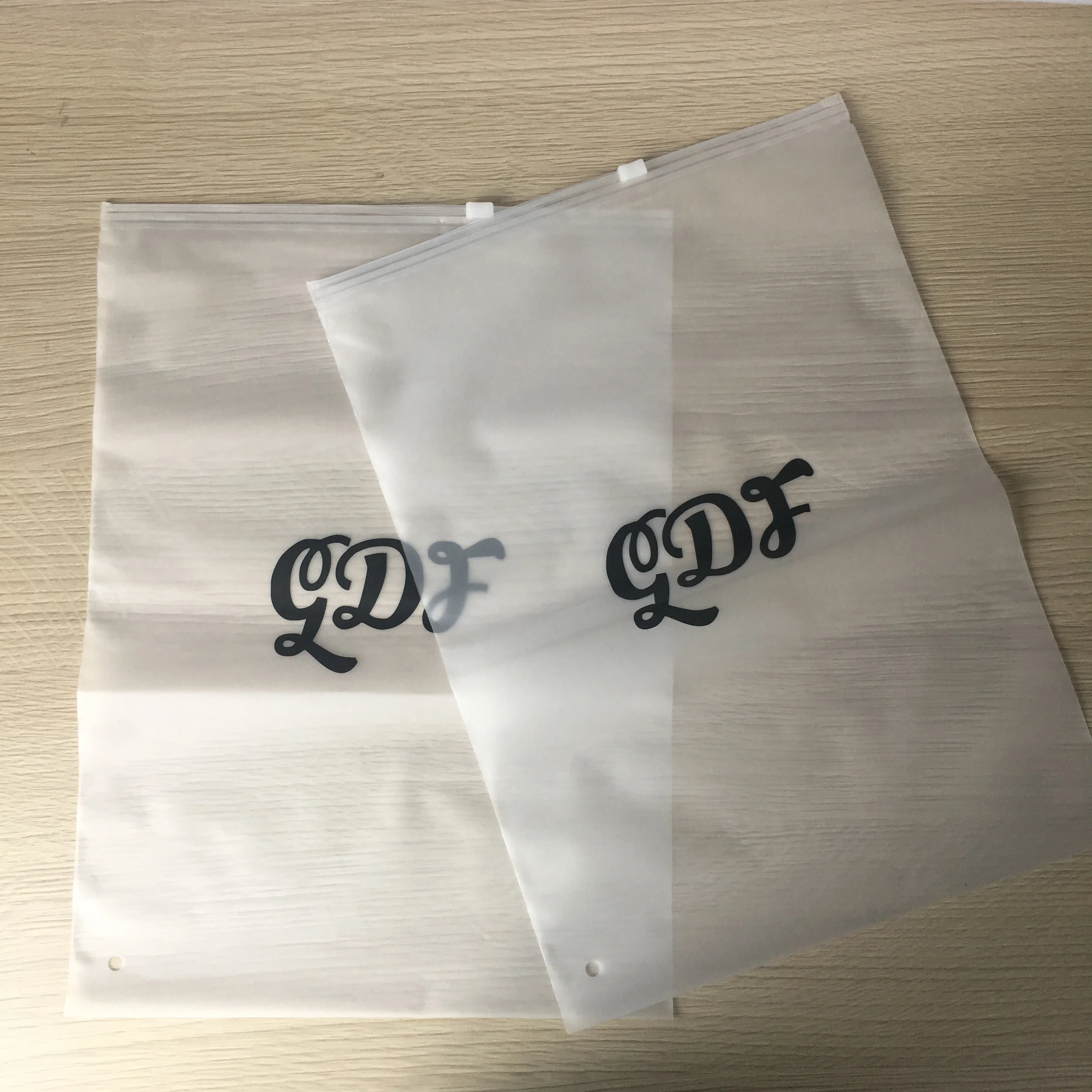 

China suppliers wholesale custom garment PVC EVA plastic zipper bag for T-shirt packaging