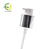 20/410 silver aluminum outer spring cream pump for turn left/right